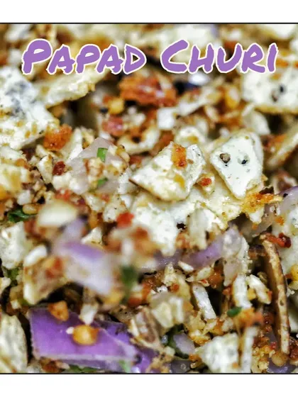 Papad Churi is a crunchy and savory side dish made from crushed roasted papad, onions, and spices.