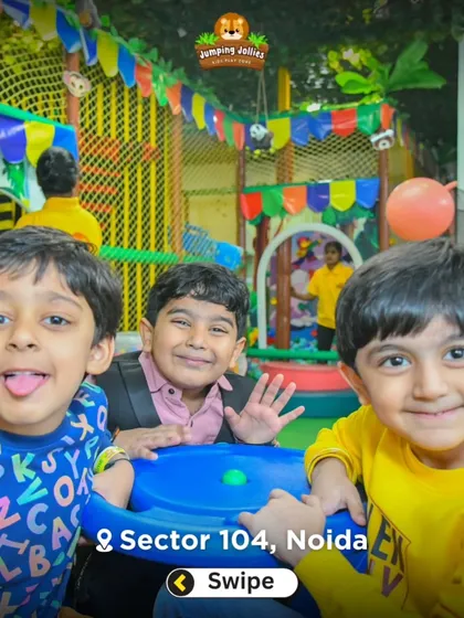 Three happy boys posing for a photo on the merry-go-round. It's a place where friendships are made and fun is had by all.