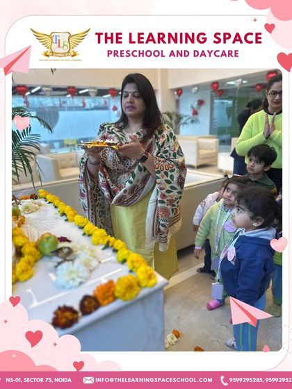 Our director participating in the Saraswati Puja ceremony with the children. Leadership by example is key to instilling cultural values.
