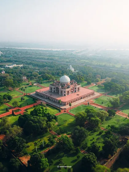 A stunning aerial view of Humayun's Tomb in Delhi. My drone shot captures the grandeur of the Mughal-era monument and its surrounding gardens, showcasing its perfect symmetry.