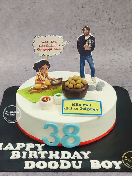 A fun and unique Golgappa cake! This design is for the ultimate street food lover, featuring an edible bowl of golgappas and a "MBA wali didi ke Golgappe" sign.