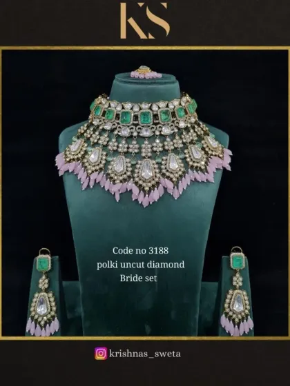 The same polki bridal set, shown with soft pink tassels. This demonstrates how we can customize pieces to match your bridal outfit.