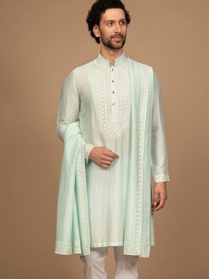 The full ensemble, featuring the pastel green kurta paired with a matching embroidered stole. The complete look is harmonious, elegant, and effortlessly stylish.