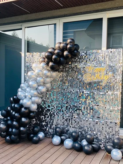 Another view of the black and silver poolside decoration.