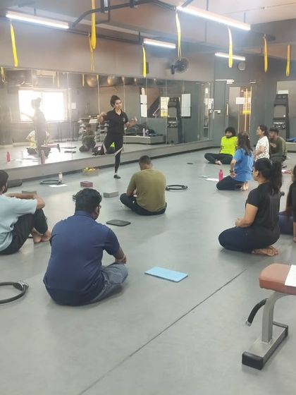 Students sit for a group discussion during a practical class, blending theory with hands-on application.