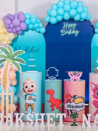 A magical 'Princess' themed birthday party, with elegant decor, shimmering backdrops, and royal props, making every little girl feel like royalty.