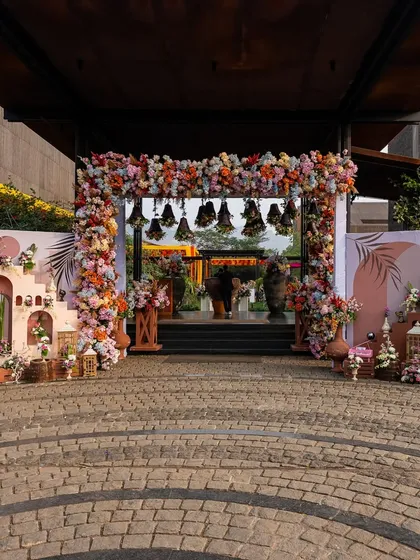 The grand entrance to the "Vibrant Blooms Carnival," a masterpiece of floral art and structural design, creating an unforgettable first impression.