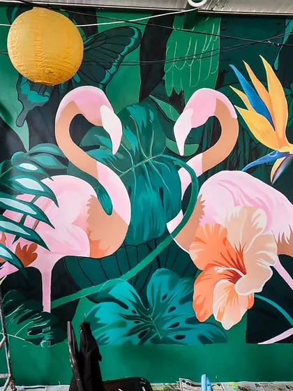 We transformed a wall at Le Terrace Cafe in Nagarbhavi with this lush, tropical flamingo scene. The vibrant pinks and deep greens create a warm and inviting atmosphere that makes the whole space feel alive.