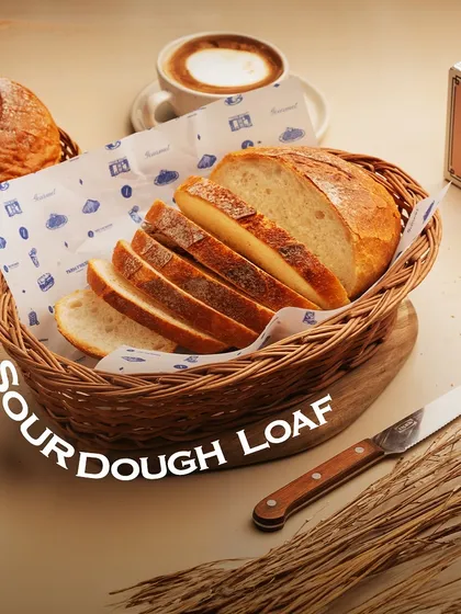 Another look at my beautiful, crusty Sourdough Loaf, sliced and ready to be enjoyed with a pat of butter.
