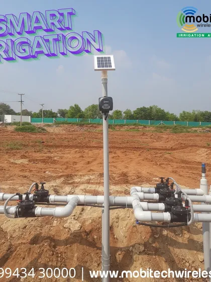 A smart irrigation system installed in Tamil Nadu, featuring a solar-powered controller and automated valves.