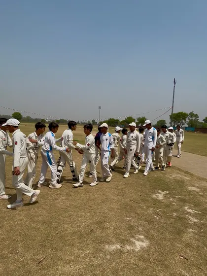 The customary handshake line, showing the spirit of cricket.