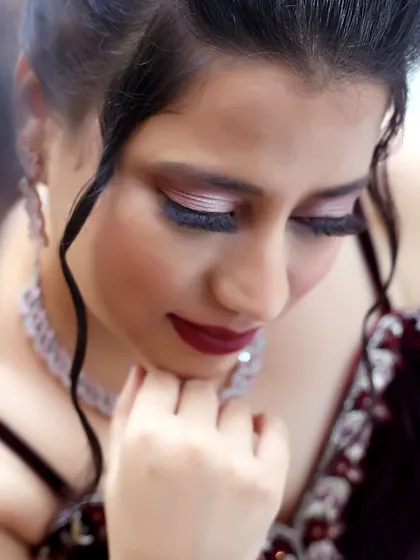 A detailed shot of the long, dramatic lashes and perfectly blended eyeshadow that define this glamorous party look.