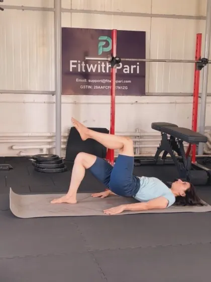 A glute bridge with a march. This move adds a stability challenge to the standard glute bridge, firing up the core and glutes.