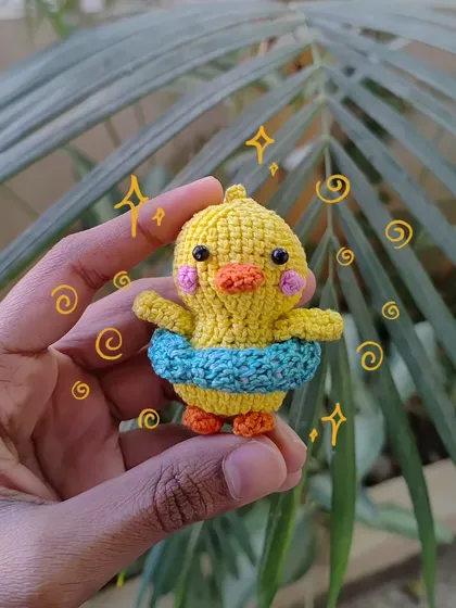 This little duckling is ready for a swim with its own tiny floatie! I love adding cute accessories to my animal creations to give them more personality.