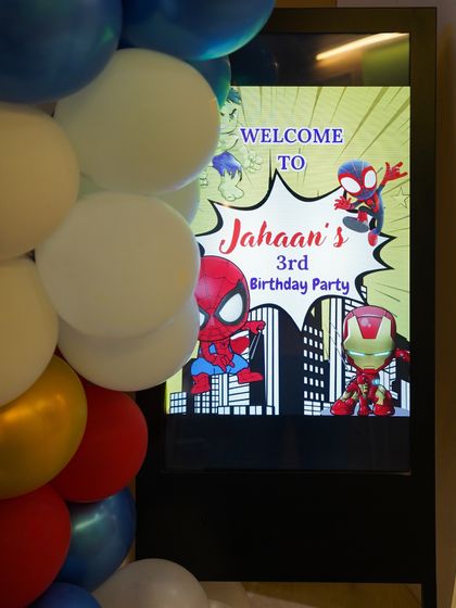 Welcome to the party. We use digital screens to display personalized welcome messages that match the party's theme, adding a modern and custom touch to every event.
