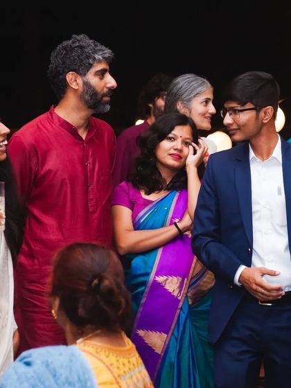 Engaging with guests at a show in Bangalore. I love the dynamic of a roaming performance, where I can interact with different groups and personalities.