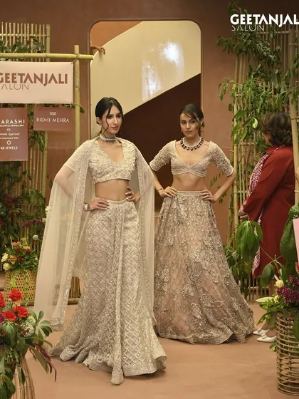 Models pose at the end of the runway during our Ahmedabad launch. The intricate hairstyles and flawless makeup were the perfect complement to Ridhi Mehra's beautiful designs.