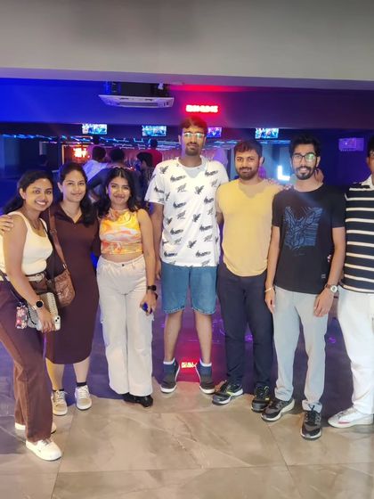 A group of friends posing for a photo.