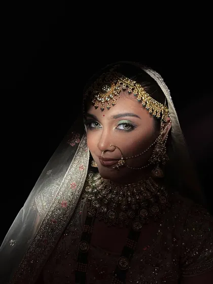 Another dramatic lighting shot that brings focus to the bride's captivating eyes.