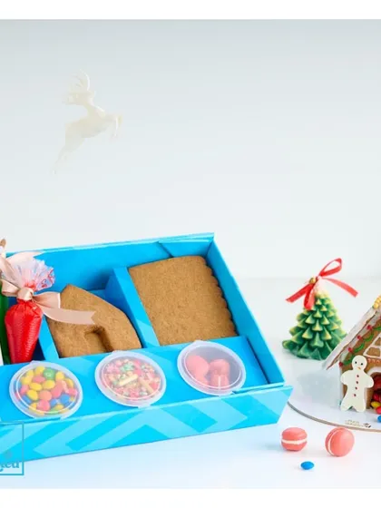 Another view of our popular DIY Gingerbread House kit. It’s a perfect holiday gift or a fun family activity, providing all the components for a delicious and creative project.