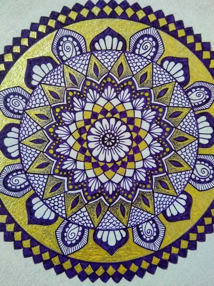 I love adding color to my mandalas. This piece uses a striking combination of deep violet and metallic gold to create a sense of energy and warmth. We explore how to use color effectively in some of my sessions.