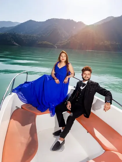 A glamorous pre-wedding shoot on the waters of Tehri lake. I arrange for the speedboat and help you style the perfect look, like this flowing blue gown, to create stunning, high-fashion portraits against the mountain scenery.