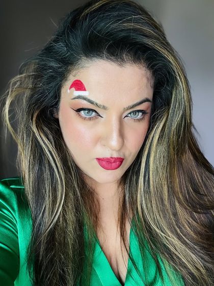 A final shot of the Christmas-themed makeup. This is a great example of how you can use makeup to be creative and festive for any occasion.