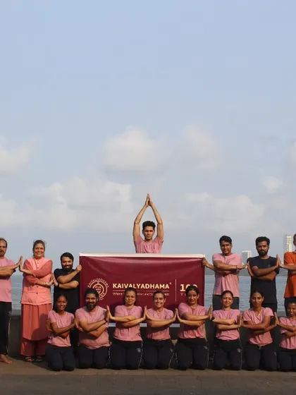 A group of my students and faculty pose for a photo at Mumbai's Marine Drive. This image captures the spirit of our community, taking the practice and principles of yoga beyond the classroom walls.