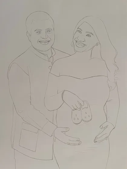 The delicate outline of the maternity portrait. Every piece begins with a careful, light sketch to ensure the composition and proportions are perfect before any shading begins.