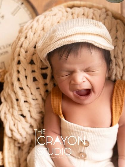 Even the fussiest moments are beautiful. This tiny yawn shows the real, unfiltered life of a newborn, full of emotion and expression.