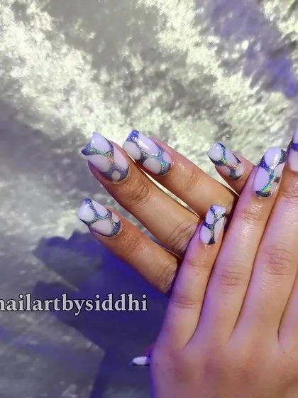A unique design featuring a 3D chrome swirl pattern over a white base for a futuristic and textured look.