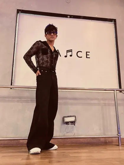 A simple shot in the studio. The word 'DANCE' says it all.