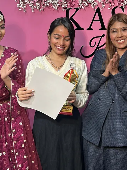 A round of applause for the winner. Her hard work and talent truly shine.