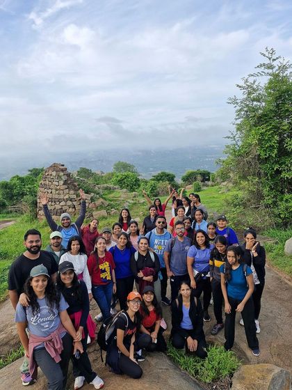 Our group posing on the trail, surrounded by the ancient fort ruins of Uttari Betta.