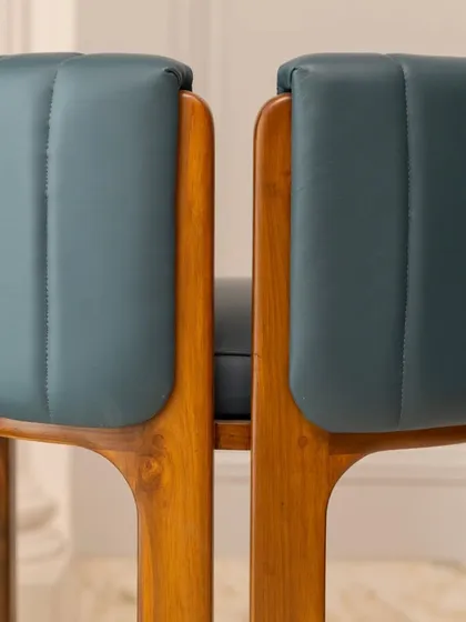 A unique view of the split-back design of the accent chair. This architectural feature not only adds visual interest but also provides ergonomic support, blending form and function.