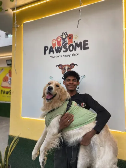 Puchi is all smiles while getting a big hug from one of our team members.