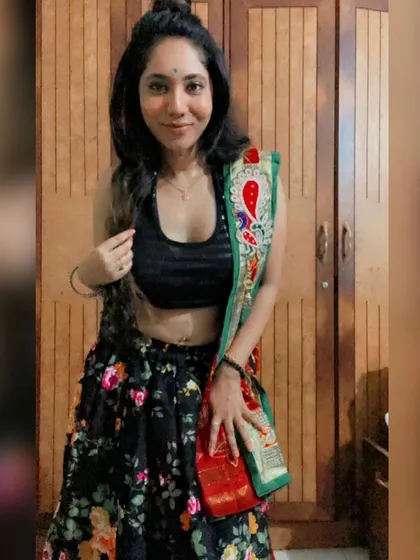A pre-event photo showing my festive attire. I pair modern tops with traditional dupattas for a unique DJ look.