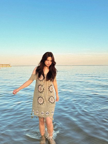 Another shot of me wading in the water, capturing a candid moment.