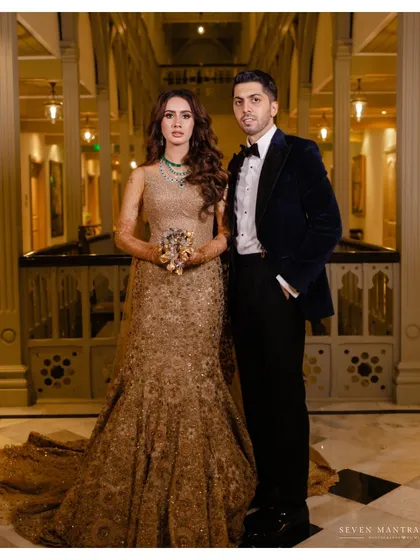 A power portrait that speaks to modern love and classic style. I directed this shot in the heritage wing of the Taj Mahal Palace, ensuring the couple's pose and coordinated formal wear exuded confidence and regal elegance.