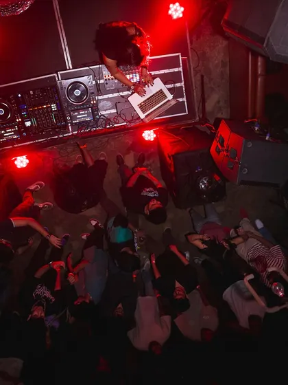 An aerial view of me playing an Ableton set at Khar Social. This perspective shows the connection between the DJ and the crowd, a dynamic we discuss in my workshops on performance and crowd reading.