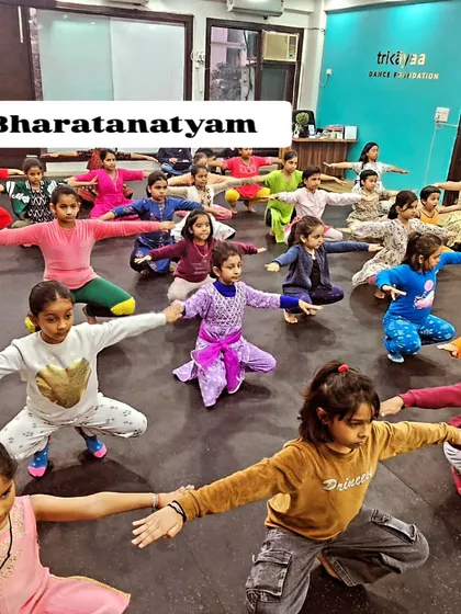 A full class of young Bharatanatyam learners at our studio. We welcome students of all ages and levels, fostering a disciplined yet nurturing space for them to grow as artists.