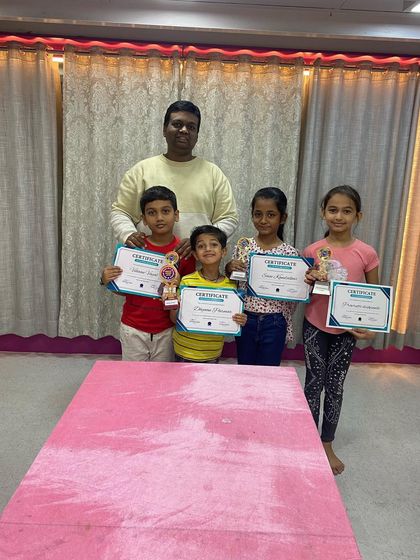 A group of our abacus achievers from the Charni Road branch with their instructor after the prize distribution.