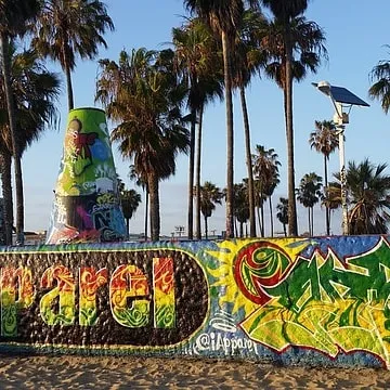 A vibrant, classic graffiti piece for an outdoor location. We can create custom lettering and characters to reflect a brand's identity or a specific theme.