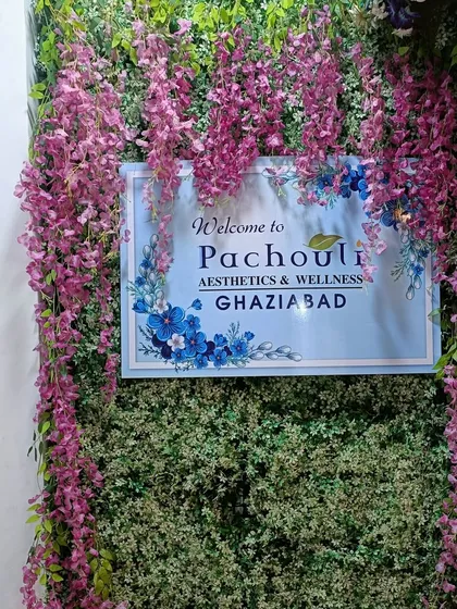 The entrance to our Ghaziabad clinic, adorned with a beautiful floral wall. This "Welcome" sign is more than just a greeting; it's an invitation to step into a space dedicated to your aesthetic and wellness needs.