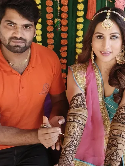 Posing with a popular Marathi actor after completing her stunning bridal-style mehandi for an event. Our team is experienced in working on film and television sets.
