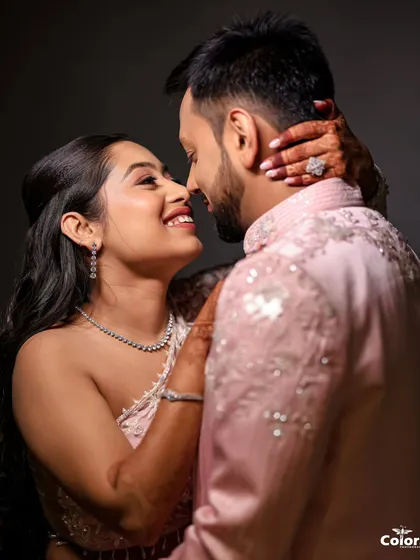 A beautiful, happy portrait of the couple, capturing the bride's joyful expression as she looks at her new fiancé.