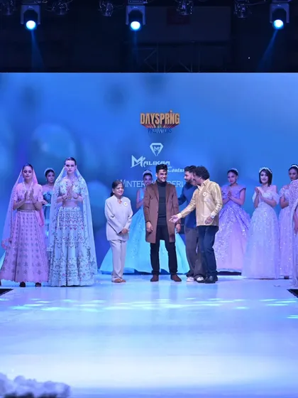 Taking a bow with the show's organizers and my beautiful models. It takes a village to create such a magical show.
