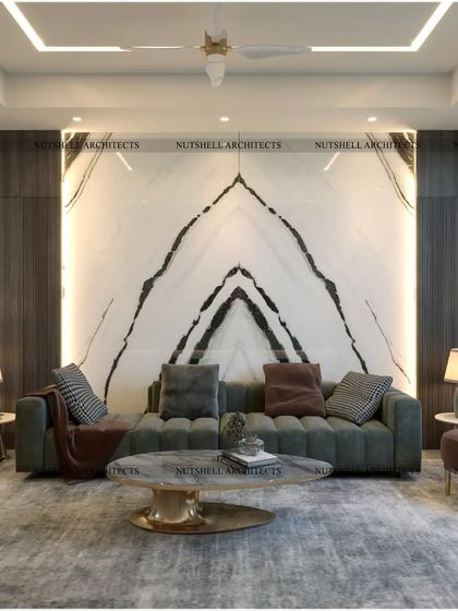 Here, we used a bookmatched marble slab to create a stunning, symmetrical feature wall. The natural veining of the stone acts as a piece of art, elevated by concealed backlighting that gives it a warm glow.