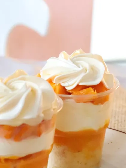 A close-up on the layers of the Mango Sundae Glass.