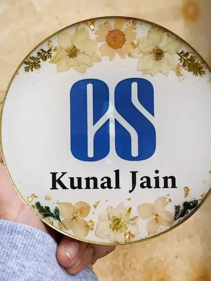 This 6-inch desk frame is a great way to acknowledge professional achievements. I created this piece with a company secretary's logo and name, surrounded by delicate preserved flowers.